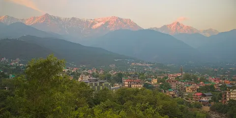 Dhauladhar range glowing at sunset above Dharamshala