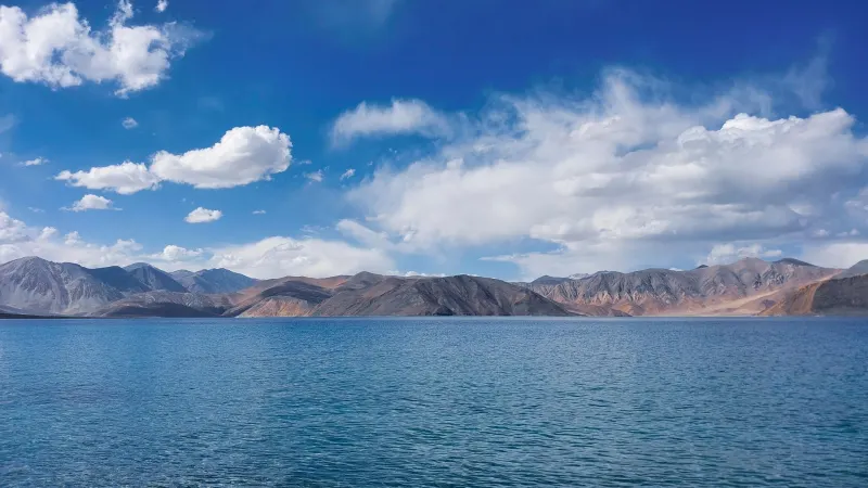 Pangong Lake and mountains under a blue sky, Ladakh