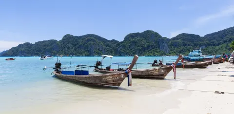 Longtail boats on a beach at Koh Phi Phi Don, Thailand